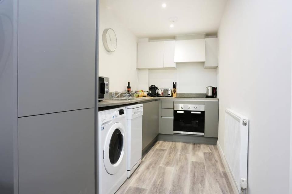 Kitchen or kitchenette, washing machine