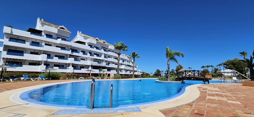 Property building, Living room, Swimming pool