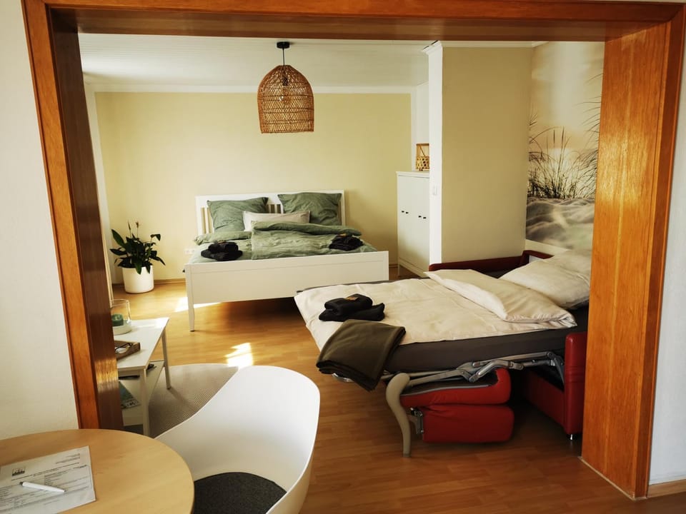 Bed, Seating area, Bedroom