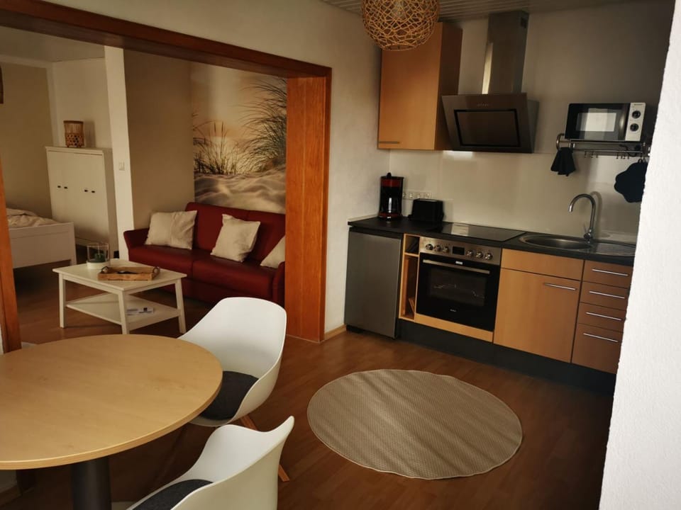 Kitchen or kitchenette, Seating area, Dining area, stove
