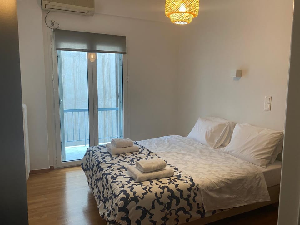 Bed, Photo of the whole room, Bedroom, towels, air conditioner