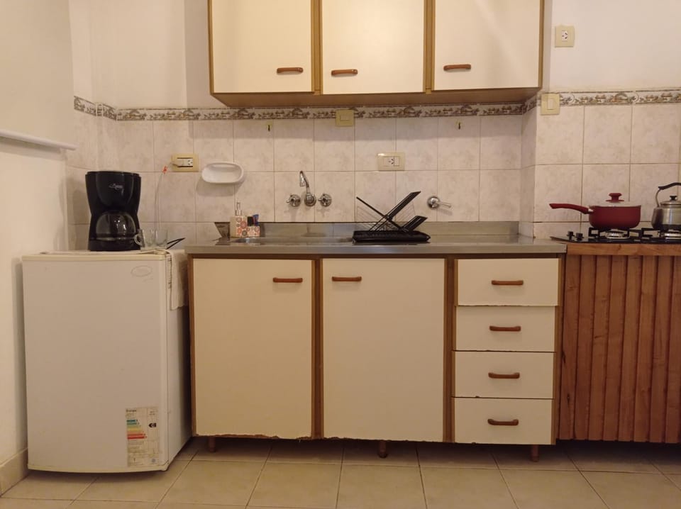 Kitchen or kitchenette, oven, toaster