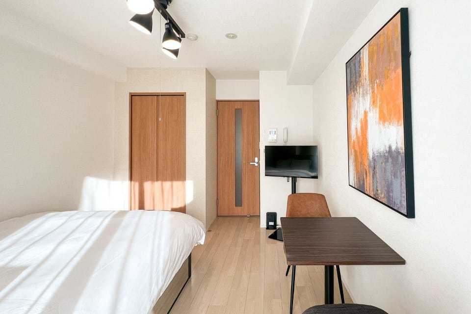 Bed, TV and multimedia, Seating area, Bedroom, hair dresser, wardrobe