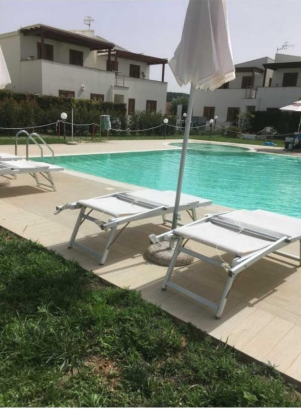 Property building, Living room, Swimming pool