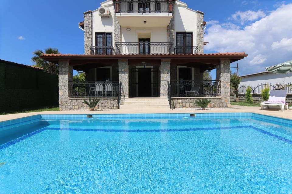 Property building, Patio, Swimming pool, sunbed