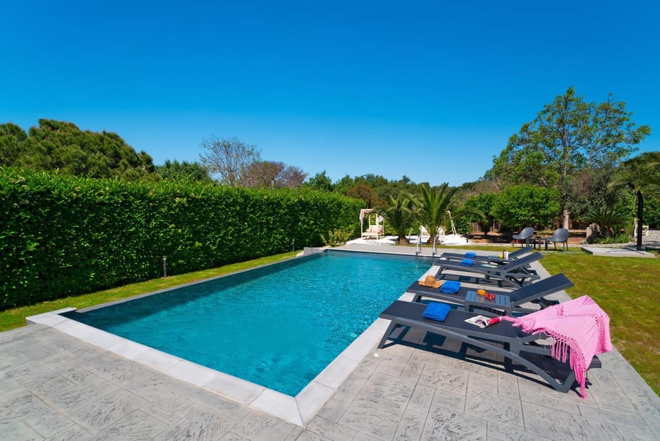 Natural landscape, Garden, Swimming pool, sunbed