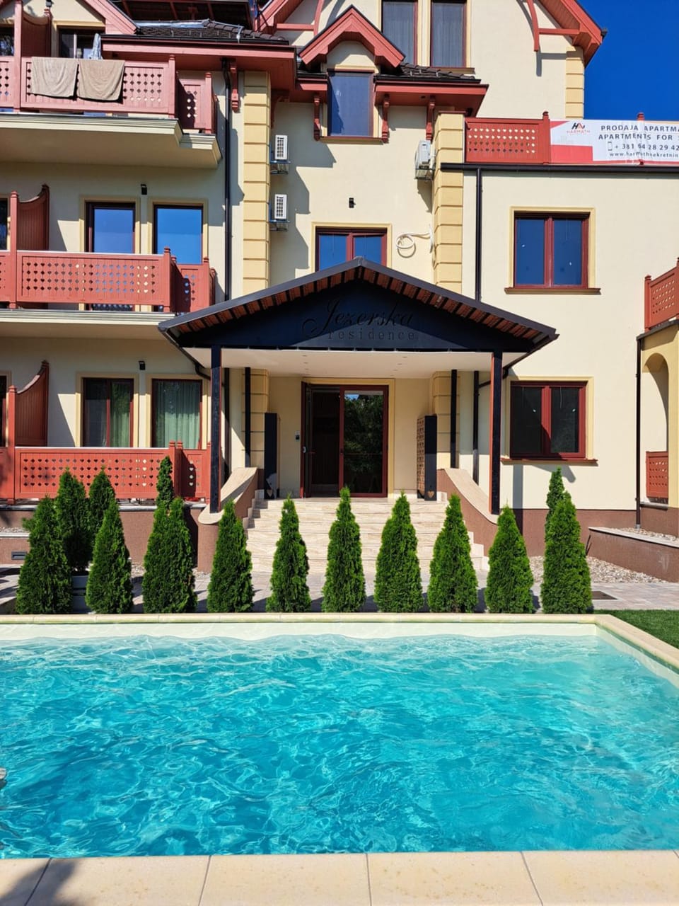 Property building, Day, Pool view, Swimming pool