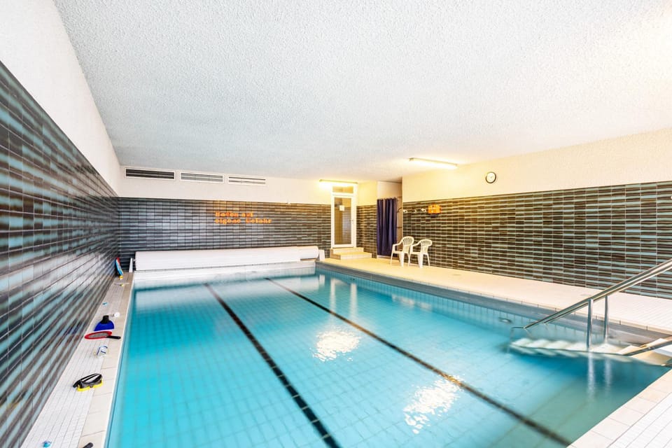 Property building, Living room, Swimming pool
