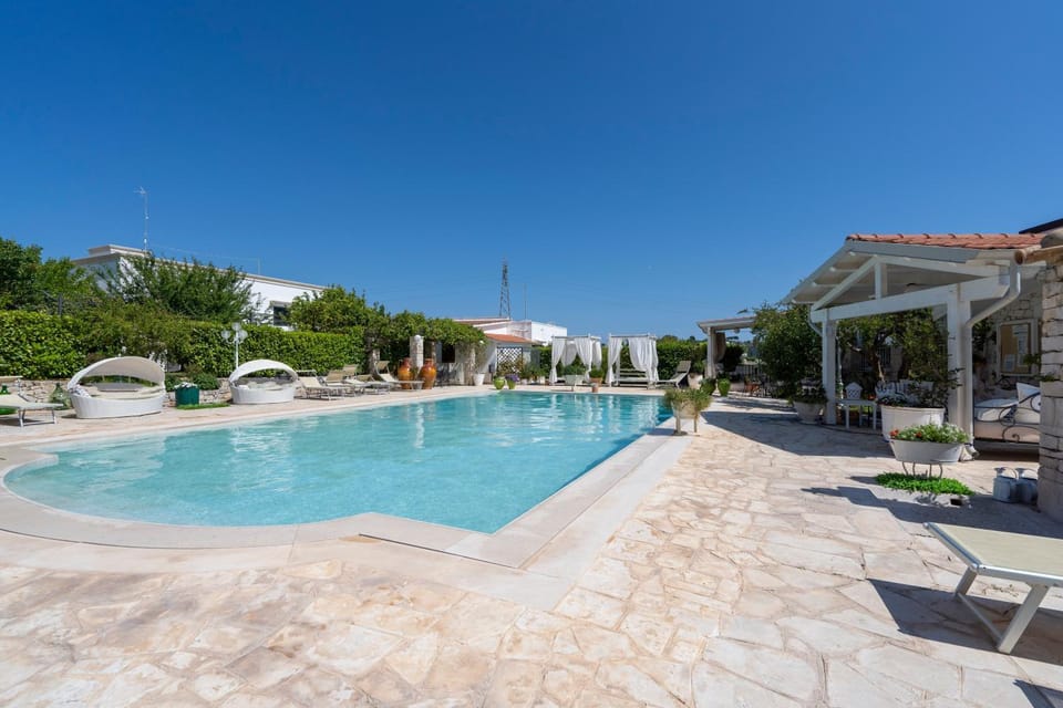 Property building, Living room, Swimming pool
