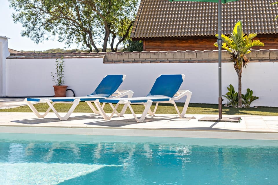 Property building, Living room, Swimming pool