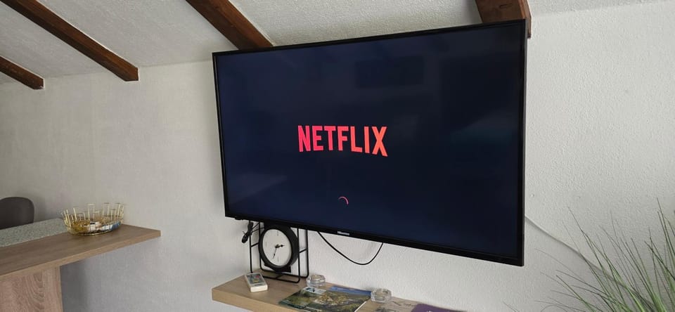 Communal lounge/ TV room, Evening entertainment, Text overlay