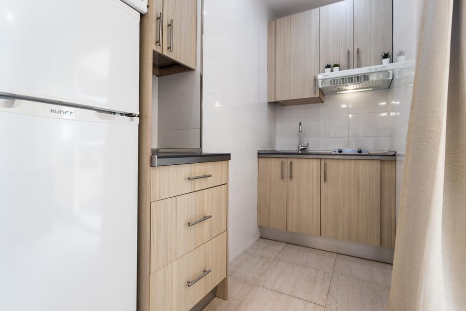 Kitchen or kitchenette, stove, wardrobe