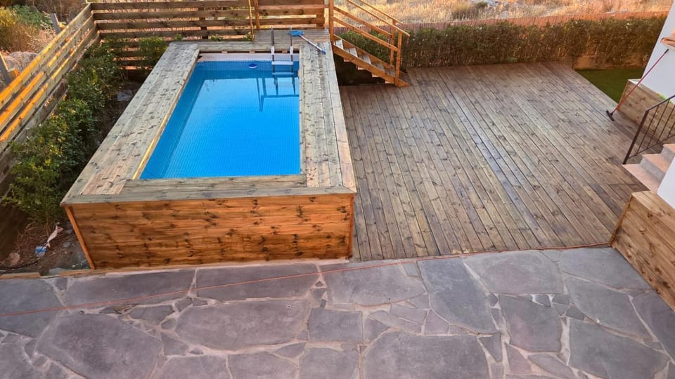 Patio, Day, Pool view, Swimming pool, sunbed