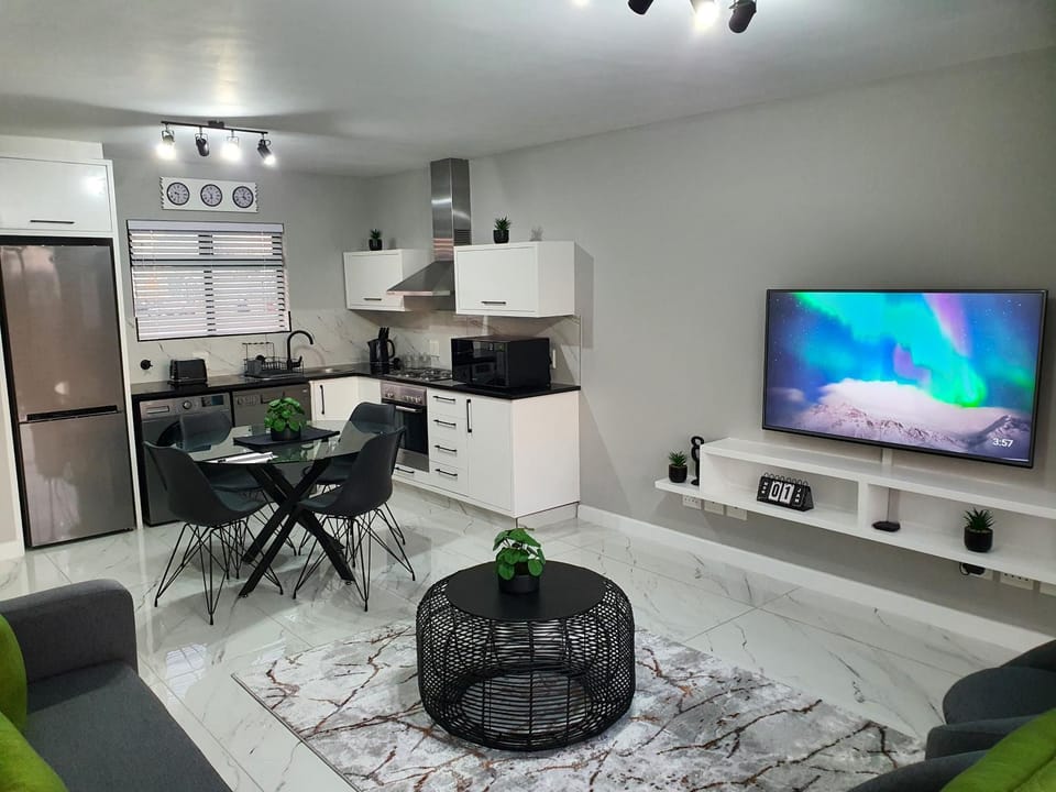Kitchen or kitchenette, Living room, Seating area, Dining area, stove
