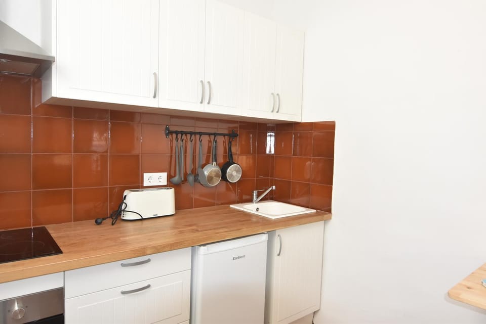 Kitchen or kitchenette, toaster