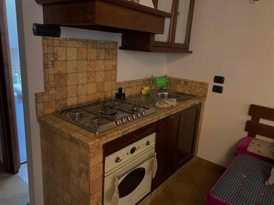 Kitchen or kitchenette, stove