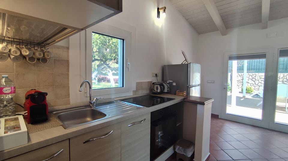 Kitchen or kitchenette, toaster, kitchen, air conditioner