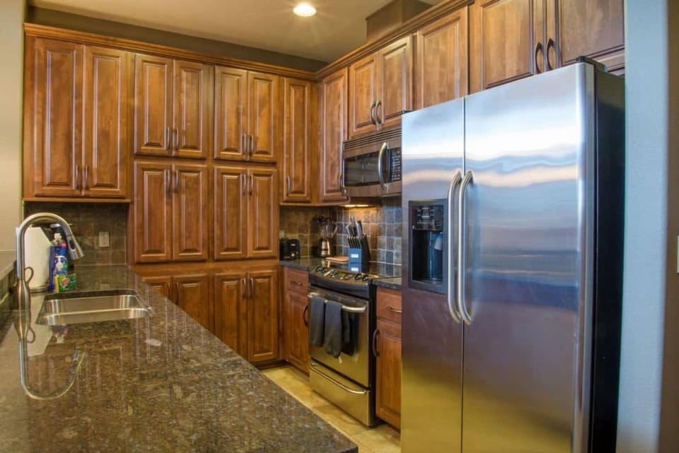 Kitchen or kitchenette, furniture, microwave, oven, stove, kitchen
