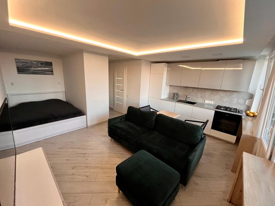 Bed, Living room, Seating area, Bedroom