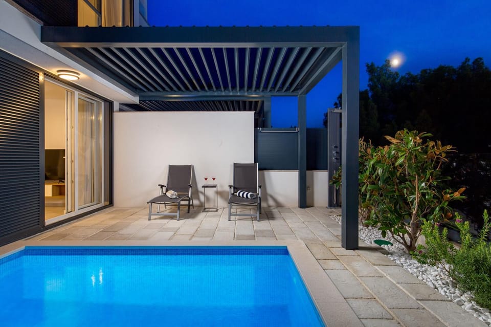 Patio, Night, Swimming pool, sunbed