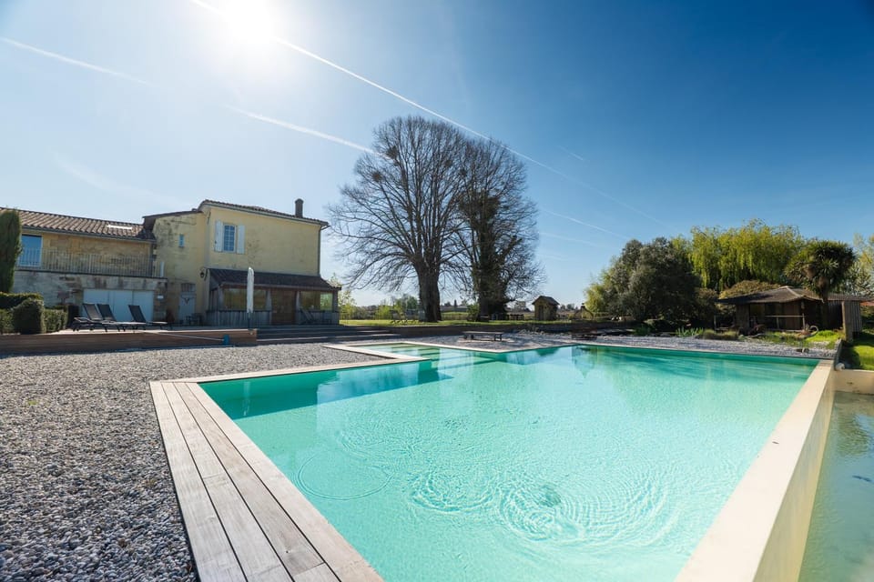Property building, Day, Pool view, Swimming pool, sunbed