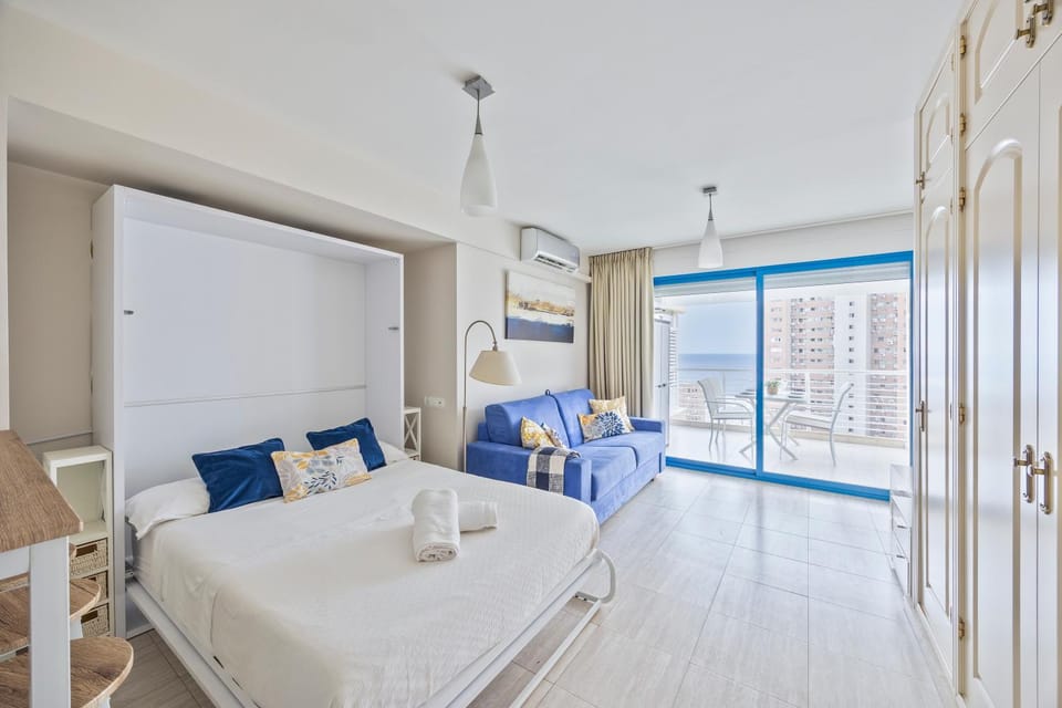 Bed, Balcony/Terrace, Living room, Dining area, Bedroom, towels, wardrobe, air conditioner
