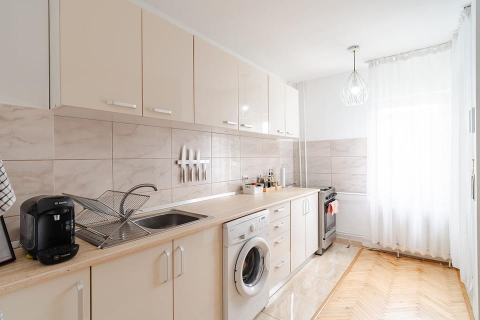 Kitchen or kitchenette, stove, washing machine