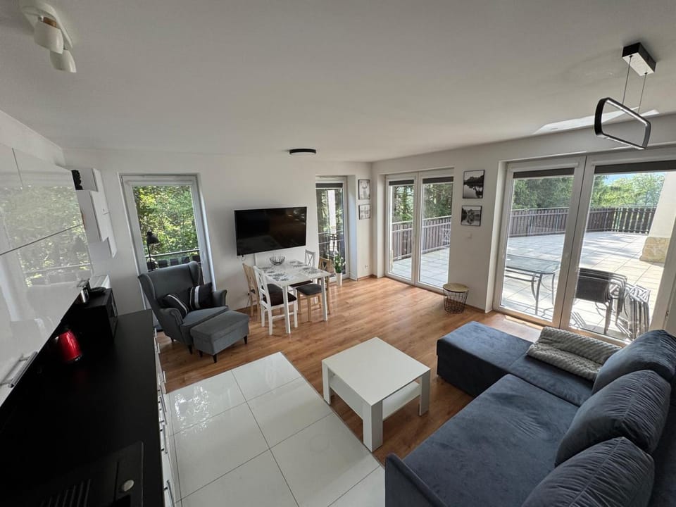 Off site, People, Balcony/Terrace, Other, Photo of the whole room, Food, Text overlay, Guests, Family, Quiet street view, furniture, stove, kitchen