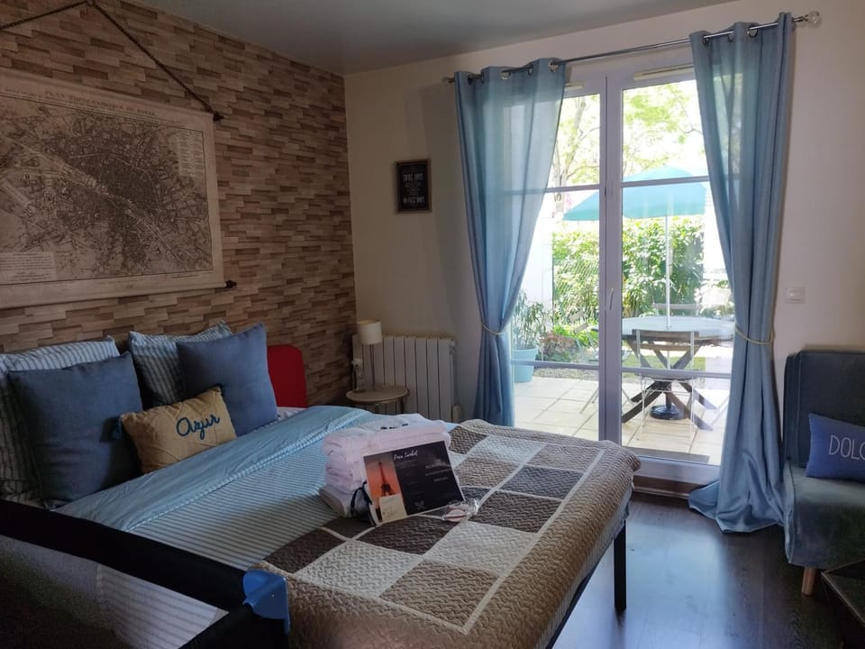 La Clef du Bonheur - 8 Min de Disney Jardin & Garage privatif Apartment in Bailly-Romainvilliers
