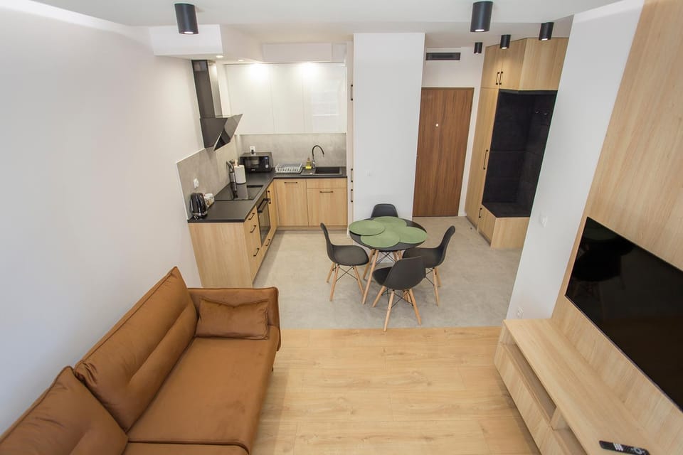 Kitchen or kitchenette, Living room, Seating area, Dining area