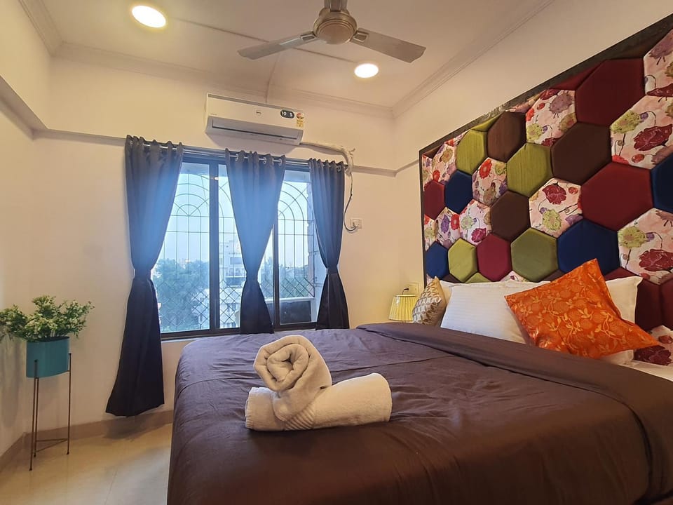 Bed, Bedroom, fireplace, towels, air conditioner