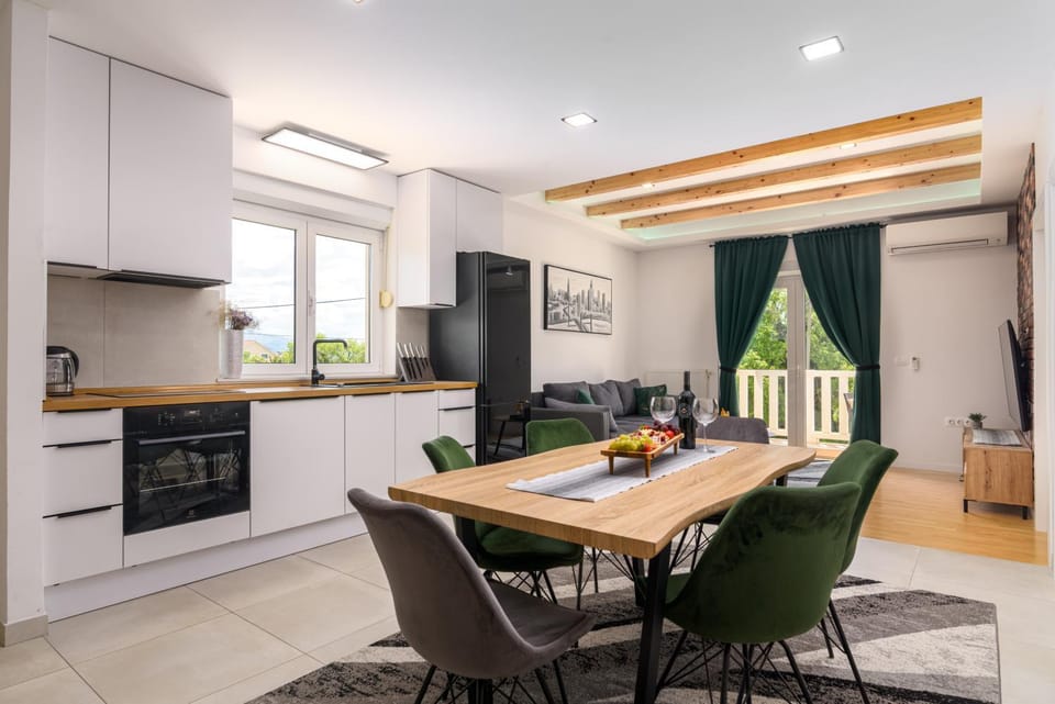 Kitchen or kitchenette, Living room, Seating area, Dining area, oven, stove, kitchen