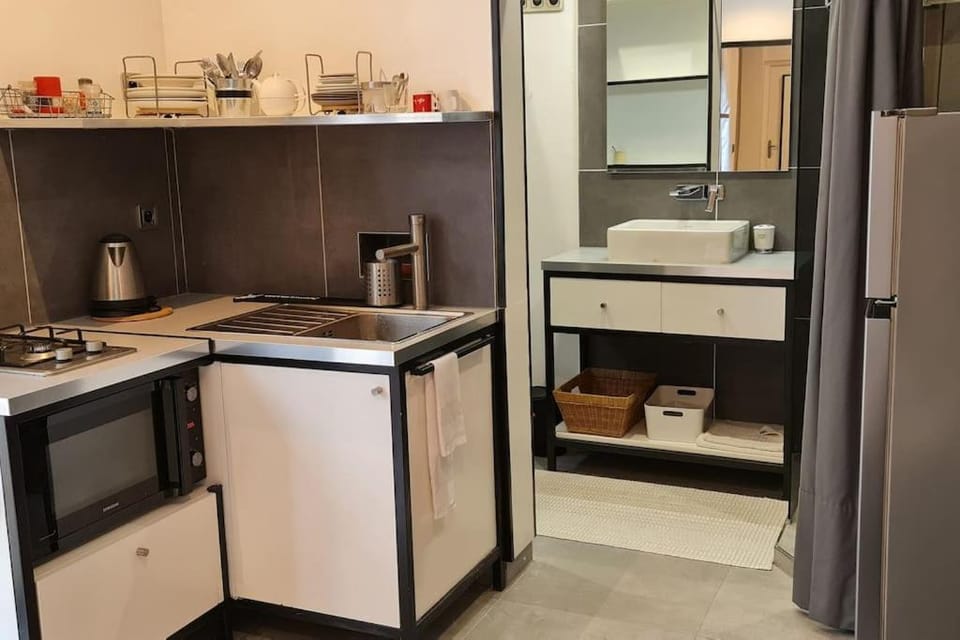 Studio BARACHOIS, 26 m² rez de jardin Apartment in Saint-Denis