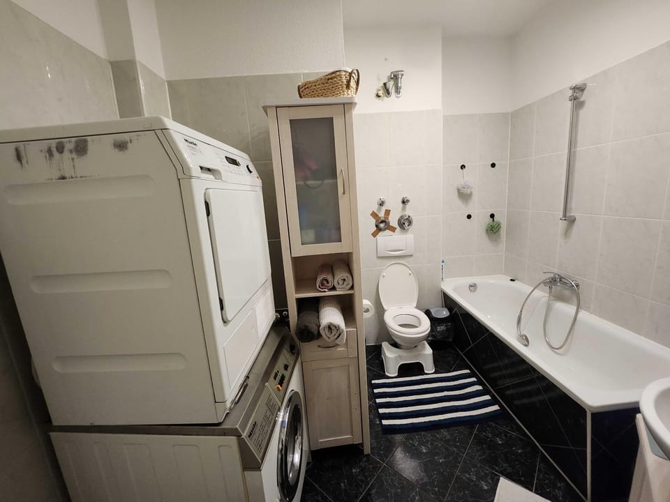 Shower, Toilet, Bathroom, Bath, towels, washing machine, dryer