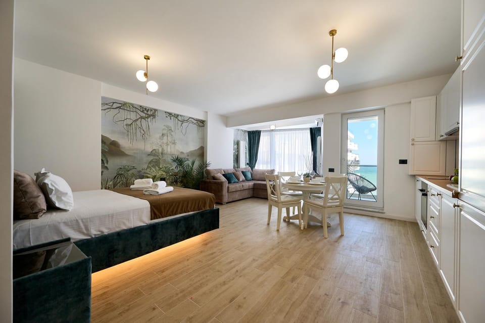 Bed, Living room, Seating area, Dining area