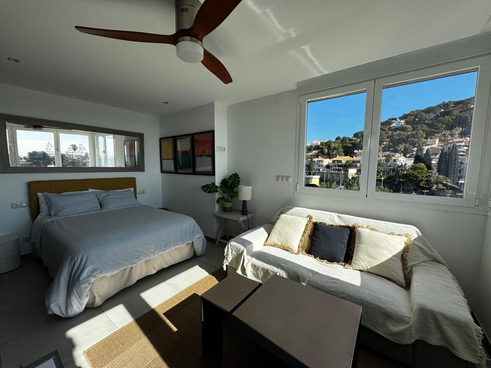 Bed, Living room, Photo of the whole room, Seating area, Garden view, Garden view, Mountain view, Mountain view, River view, Sea view