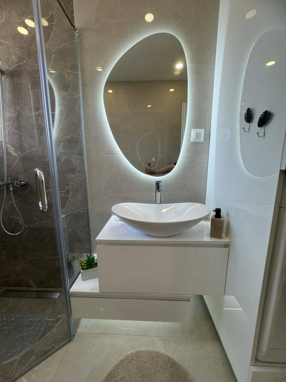 Shower, Toilet, Bathroom, hair dryier, washing machine