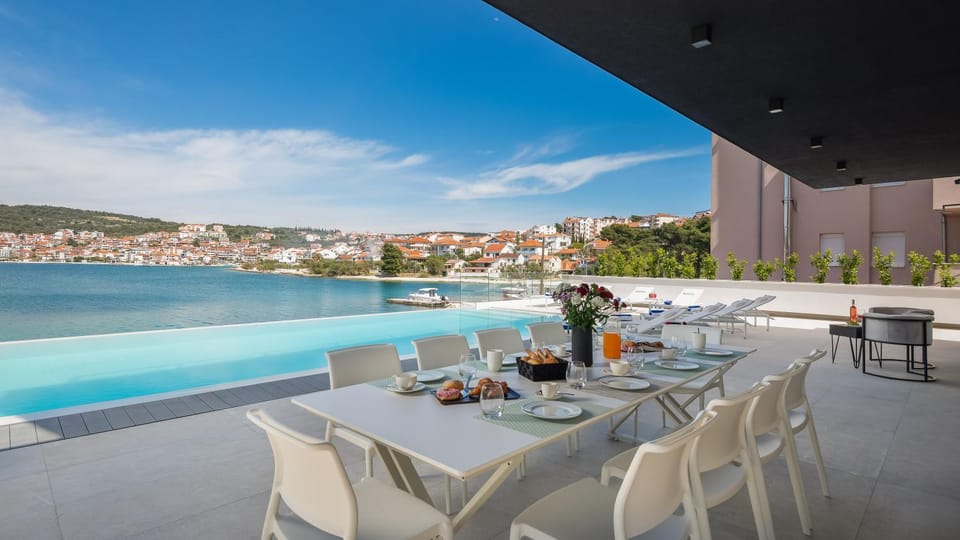 Patio, Dining area, Pool view