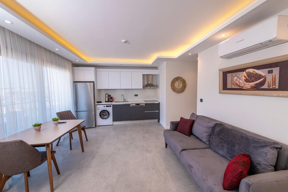 Living room, Seating area, Dining area, dishwasher, stove, washing machine