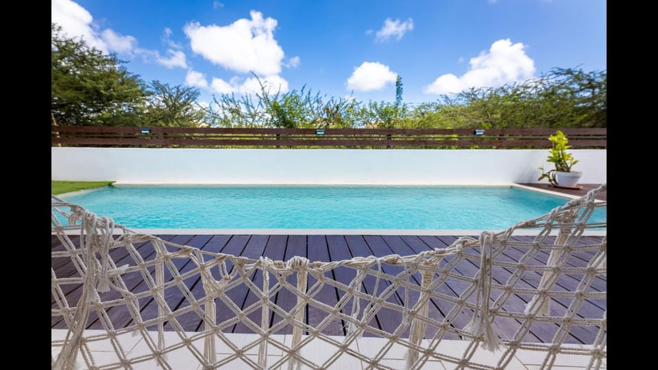 Swimming pool, sunbed