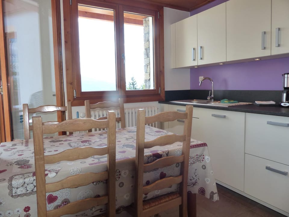 Dining area, dishwasher, oven, stove
