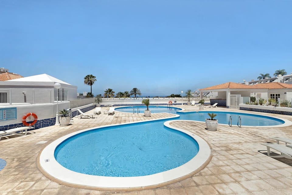 Property building, Living room, Swimming pool