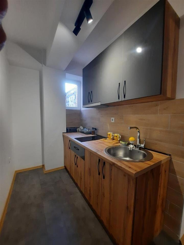 Kitchen or kitchenette, stove
