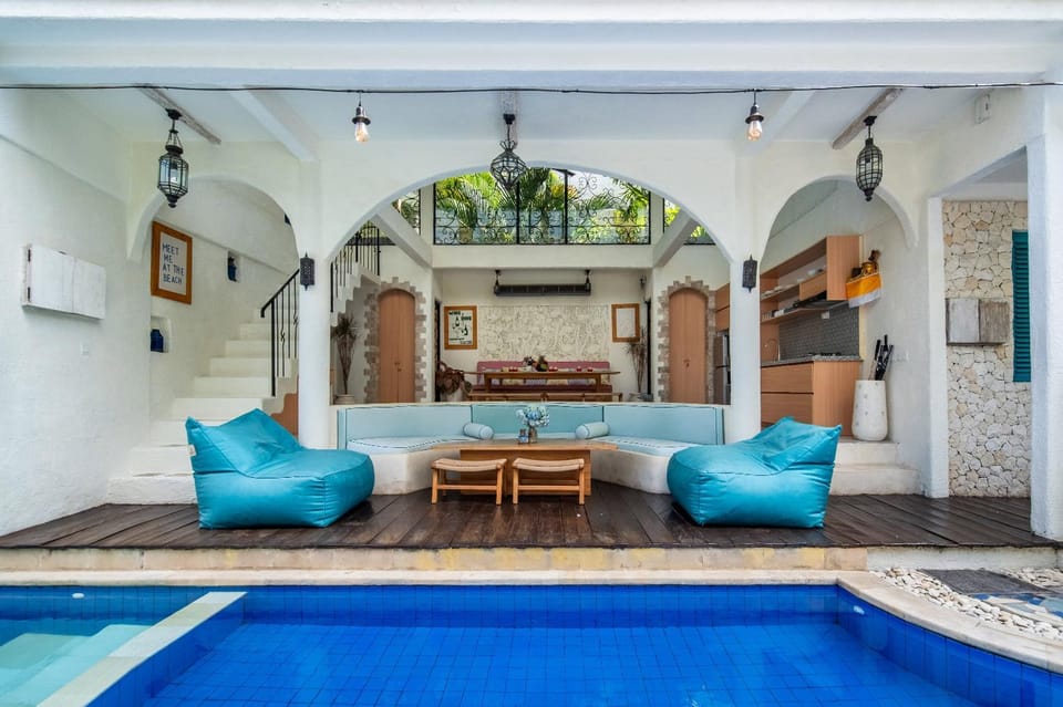 Property building, Living room, Seating area, Dining area, Swimming pool
