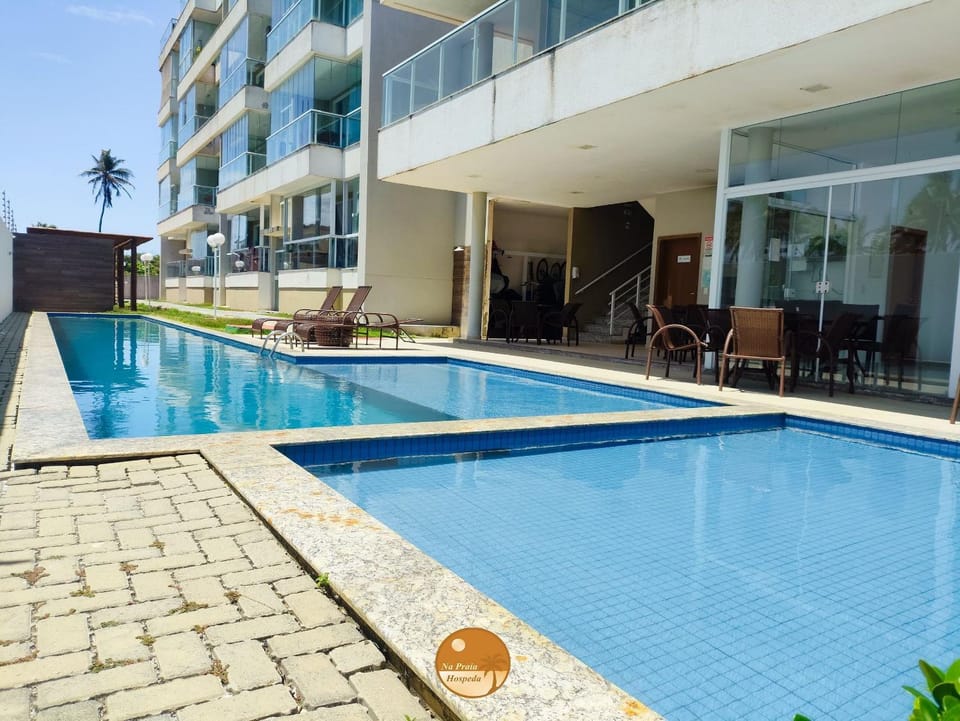 Residencial Ilha de Santorini, 100 m da Praia, Pico de Surfe, Piscina, Parque infantil, 2 Vagas de Garagem Apartment in Salvador