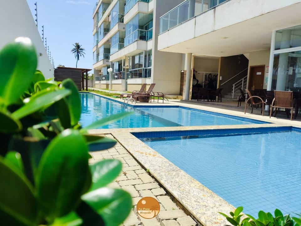 Residencial Ilha de Santorini, 100 m da Praia, Pico de Surfe, Piscina, Parque infantil, 2 Vagas de Garagem Apartment in Salvador