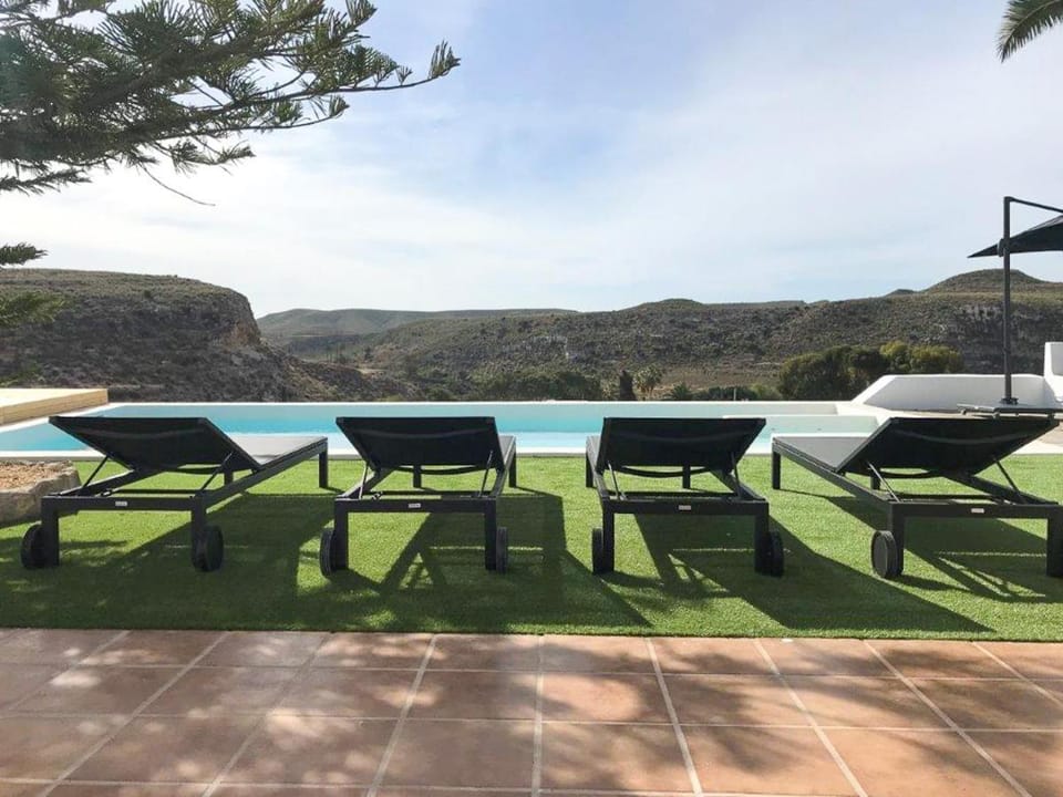 Natural landscape, View (from property/room), Mountain view, Swimming pool, sunbed