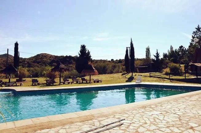 Property building, Patio, Off site, Day, Natural landscape, Garden, View (from property/room), Garden view, Mountain view, Pool view, Area and facilities, Swimming pool, sunbed