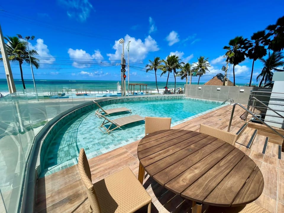 View (from property/room), Pool view, Sea view, Swimming pool, sunbed