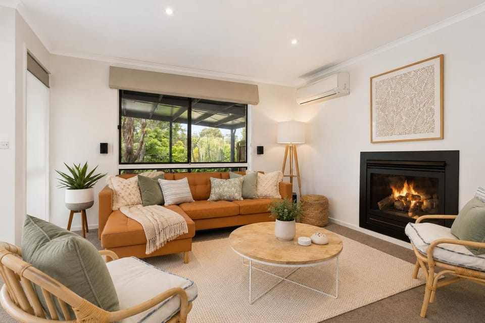 Living room, Seating area, Garden view, fireplace, air conditioner